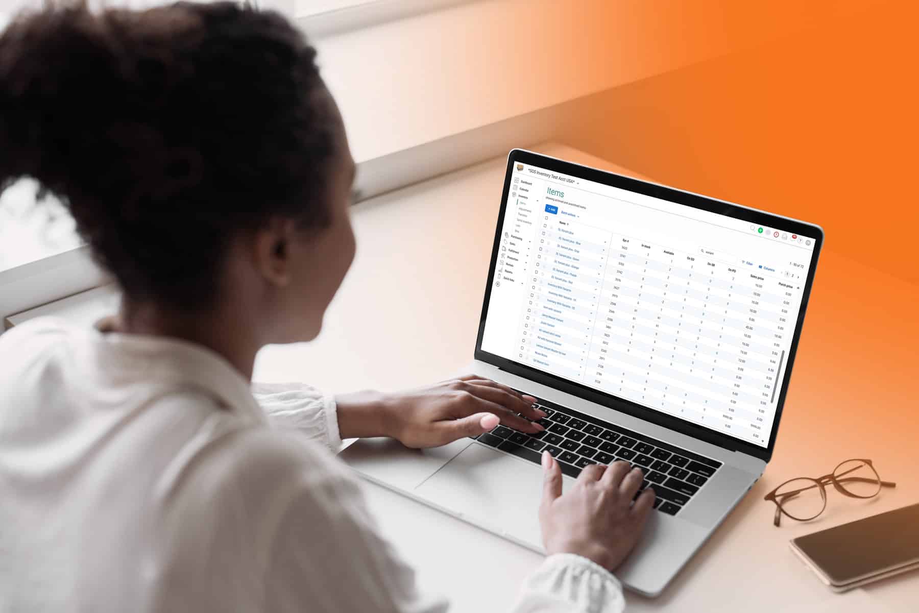 woman looking at sos inventory software
